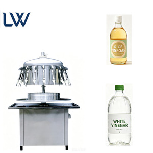 Remplisseuse de liquides semi-automatique électrique à siphon pour jus de <span class=keywords><strong>Campari</strong></span> et de pamplemousse en bouteilles plastiques et en verre – Vente directe usine depuis 20 ans - Product Image 1