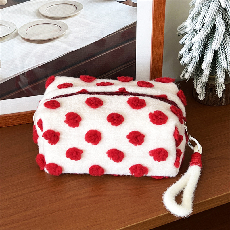 Hand in woolen polka dot white. pillow bag