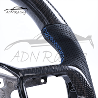 Vente en gros d'accessoires pour Ford Mustang S650, volant en fibre de carbone avec surpiqûres bleues et garniture de boutons, 2024 et plus