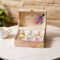 Boîte d'emballage de luxe personnalisée en forme de livre avec insert en mousse, faible MOQ, livraison rapide, pour 3 flacons de parfum avec fermeture à ruban