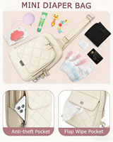 Petite sacoche à bandoulière pour couches avec pochette pour lingettes, mini sac à couches avec matelas à langer portable