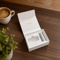 Boîte cadeau magnétique blanche de luxe avec estampage doré et insert en EVA