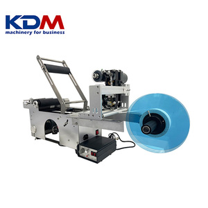KDM-SL50 bán tự động máy dán nhãn hoạt động đơn giản dán nhỏ chai tròn Máy dán nhãn với ngày mã hóa - Product Image 3