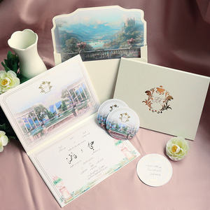 การ์ดเชิญงานแต่งงานแบบหนังสือปกแข็งพร้อมภาพพิมพ์สถานที่จัดงานแบบสีน้ำ ซองจดหมายแบบมีซับใน และการ์ดกระดาษเคลือบฟอยล์สีทอง - Product Image 1