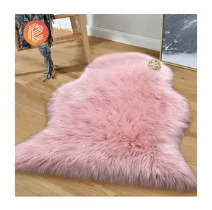 蓬松粉红色羊皮床边人造毛皮地毯