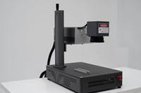 Machine de marquage laser UV 355nm portable à bas prix refroidie par air Petit laser Sculpture de feuilles en plastique, bouteilles en verre