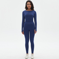 Vente en gros de leggings de fitness à manches longues personnalisés ensemble de deux pièces combinaison de yoga sans couture à haute élasticité et de couleur unie pour femmes