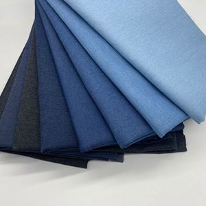 Vải denim thô dệt thun, chất liệu 70% cotton, 28% polyester, 2% spandex, đã qua xử lý giặt mềm, kiểu dáng hiện đại, bán buôn giá gốc, thích hợp may quần. - Product Image 1