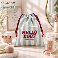 Sac à cordon en coton biologique OEM ODM pour fards à joues et cosmétiques, avec logo personnalisé par transfert thermique, pochette de rangement rayée pour maquillage