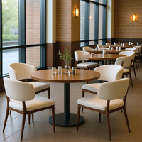 Meubles de restaurant modernes en similicuir J2S sur mesure avec chaise à structure en bois massif et ensemble de table ronde pour projets hôteliers