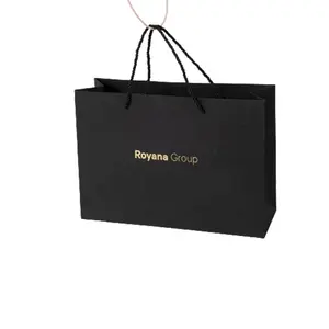 Lüks yumuşak dokunuşlu mat laminat şerit kolu siyah kağıt alışveriş torbası özel logo