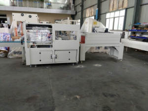 Machine d'emballage sous film rétractable automatique <span class=keywords><strong>pour</strong></span> serviettes de <span class=keywords><strong>cuisine</strong></span> en rouleau Maxi, certifiée CE, idéale <span class=keywords><strong>pour</strong></span> les petites entreprises, à bon prix - Product Image 3