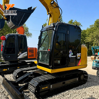 Excavatrice à moteur d'occasion, poids opérationnel 6000 kg, capacité de la benne 0,22 m³, moteur puissant 35000 W, modèle 2023, pompe et boîte de vitesses.