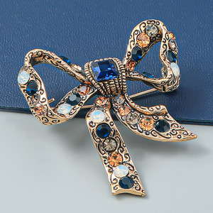 新作リボンダイヤモンドブローチファッション宴会ドレスアクセサリー絶妙なダイヤモンドブローチ高品質レディースジュエリー - Product Image 5