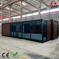 Maison de conteneur extensible préfabriquée à l'épreuve des ouragans de 20 pieds 30 pieds 40 pieds Villa préfabriquée portable en acier 2 chambres avec salle de bain