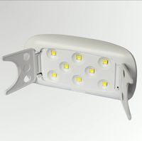 Bestseller 12W Nageltrockner mit 8 LEDs UV-Lampe Blitz Mini Tragbare Tischlampe Design für den Heimgebrauch