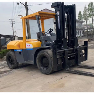Montacargas Manual Usado de 10 Toneladas con Motor Diésel TCM FD100 Modelo Japonés, Mástil de Dos/Tres Etapas, Longitud de Horquilla de 1000 mm - Product Image 1
