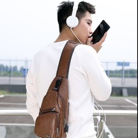Nouveau Sac de Poitrine Homme 2026 avec Port USB, Sac Bandoulière Croisé en PU, Fermeture Éclair, Design Simple, Polyvalent et Élégant