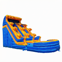 Château gonflable aquatique bleu pour enfants avec toboggan et zone de saut, idéal pour la plage et les activités aquatiques en extérieur