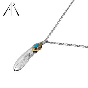 Collier unisexe à pendentif plume de turquoise en argent sterling: Collier unisexe de luxe rebelle-chic et polyvalent - Product Image 1