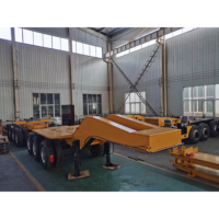Semi-remorque porte-poutres robuste en acier avec capacité de charge de 80 tonnes, 4 essieux, 16 pneus pour le transport de matériaux de construction