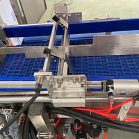 Botella de agarre robótica completamente automática/latas envolventes alrededor de caja de embalaje de cartón máquina de encuadernación línea de envasado de bebidas