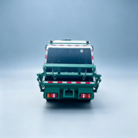 Truk Sampah Compactor HOWO 4x2, Truk Sampah Compactor HOWO 7 Meter Kubik, Truk Sampah Compactor HOWO