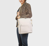 Sac à dos pour couches, sacs à couches en cuir imperméables avec station de change pour bébé, sac à dos de voyage tendance pour maman et papa