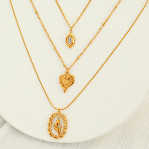 สร้อยคอรูปวงรีสไตล์เกาหลี ดีไซน์ฉลุลาย ประดับจี้รูปหัวใจดอกทิวลิป ทำจากโลหะผสมสังกะสีชุบทอง ของขวัญเครื่องประดับแฟชั่น - Product Image 1