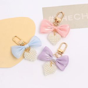 Llavero con lazo dulce, lazo de mariposa, cadena de perlas de imitación, colgante para teléfono, correa para bolso, cordón para celular, llavero - Product Image 2