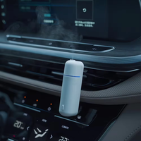 Diffuseur d'arômes électrique automatique pour voiture rechargeable par USB en gros, mini diffuseur d'huiles essentielles pour voiture, diffuseur d'arômes pour grille d'aération de voiture