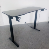 Nouvelle arrivée Bureau électrique réglable en hauteur Bureau permanent pour ordinateur Usine directe Table de jeu noire ergonomique personnalisée