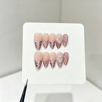 Faux ongles à presser en amande faits à la main, motif fleur 3D, strass, zèbre, léopard, œil de chat, réutilisables, vente en gros OEM ODM