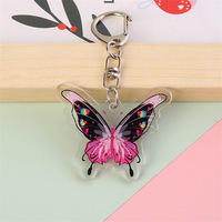 Magnifique porte-clés en acrylique pour filles avec motif imprimé de papillon, idéal pour la décoration de sac à dos