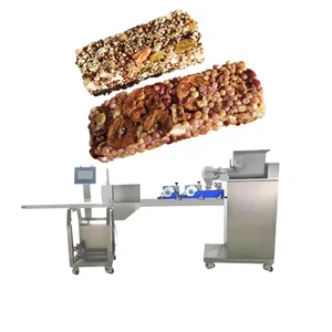 Endüstriyel protein bar şekillendirme makinesi tahıl bar makinesi fıstık kırılgan shaqima düzleştirme ve kesme makinesi