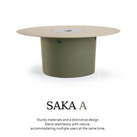 Table basse ronde moderne avec jardinière centrale intégrée, prise de charge dissimulée, mobilier d'hôtel durable et écologique pour cafés et bars