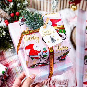 Papel de regalo navideño rosa con diseño divertido de Papá Noel en bicicleta, patrón reversible a cuadros, 17 pulgadas x 32.8 pies, para manualidades navideñas - Product Image 6