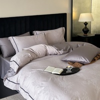 Parures de lit en coton haute densité 4 pièces, élégantes housses de couette jacquard, draps et taies d'oreiller pour chambre d'hôtel
