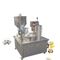 Machine de remplissage et de scellage automatique de gobelets en plastique pour sauces, jus et yaourts, fournie par l'usine