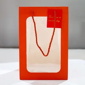 Vente en gros sac en papier rouge Shopping bijoux montre vêtements sac en papier d'emballage soins de la peau
