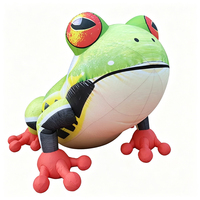 Grande grenouille gonflable réaliste et colorée avec pattes rouges pour l'affichage dans les zoos et les aires de jeux pour enfants