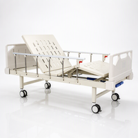 Barrière latérale métallique pour lit d'hôpital avec roulettes à frein bleues et cadre crème, pour l'ameublement des établissements de soins à long terme