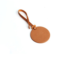 Étiquette de bagage ronde en cuir PU personnalisable, idéale pour valise, sac à main et accessoires – Nouvelle collection tendance pour femme