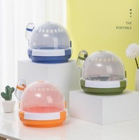 Cage à hamster portable en plastique pour l'extérieur, style OVNI, couleurs variées (bleu, vert, rose, orange), avec plateaux en plastique – Vente en gros