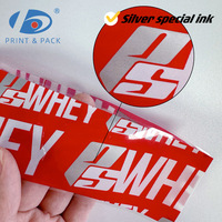 Film rétractable en PVC rouge personnalisé avec logo pour bouchon de bouteille, bande thermorétractable en plastique