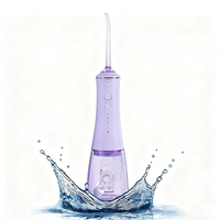 OEM Nouveau Jet d'eau électrique 300ml Meilleur irrigateur buccal dentaire Nouveau modèle en gros IPX7 Jet d'eau pour blanchir les dents Pik Water Flosser