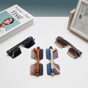 แว่นกันแดดทรงไร้กรอบสำหรับผู้หญิง สไตล์ TikTok ป้องกันรังสียูวี 400 เลนส์ PC แบบที่ 3 สีดำ ดีไซน์ระดับไฮเอนด์ - Product Image 1