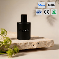 Flacons de parfum opaques les plus vendus 50ml 30ml Bouteille en verre rond noir mat avec couvercle cylindrique