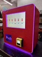 Mini máquina expendedora automática de 9 carriles con estantería en espiral y monitor publicitario táctil de 15.6 pulgadas para baños femeninos