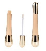 Petit flacon à double embout en ABS pour crème contour des yeux avec brosse, idéal pour l'emballage de liquides cosmétiques